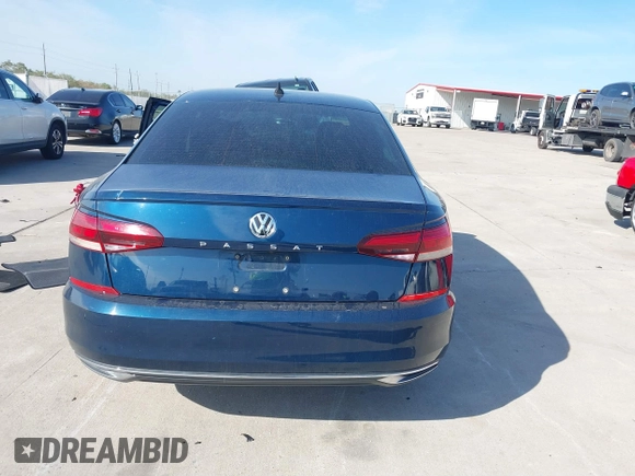 2020 Volkswagen Passat SE with VIN 1VWSA7A33LC009556, listed as a IAAI auction lot 40989431 with 96,540 mi miles and . Bid and sale history available at DreamBid. Image 16.