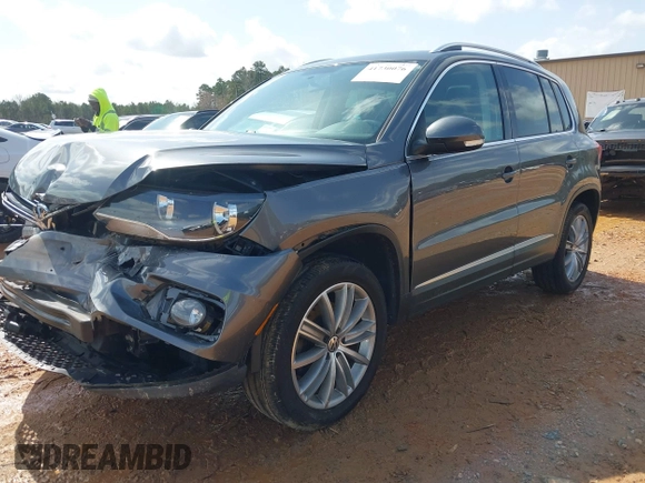 2015 Volkswagen Tiguan SE z VIN WVGBV7AXXFW503955, wystawiony jako IAAI lot #41730076 z przebiegiem 146 446 mil mil oraz . Historia ofert i sprzedaży dostępna na DreamBid. Obrazek 18.