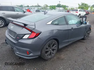 2017 Honda Civic Si with VIN 2HGFC3A50HH752223, listed as a IAAI auction lot 42273886 with 76,454 mi miles and . Bid and sale history available at DreamBid. Image 4.