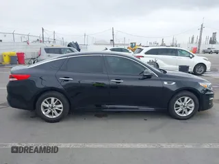 2016 Kia Optima LX with VIN 5XXGT4L37GG024243, listed as a IAAI auction lot 42098585 with 108,777 mi miles. Bid and sale history available at carsss.com. Image 14.