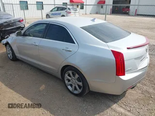 2014 Cadillac ATS Luxury RWD with VIN 1G6AB5RX7E0143954, listed as a IAAI auction lot 42156629 with 79,619 mi miles and . Bid and sale history available at DreamBid. Image 3.