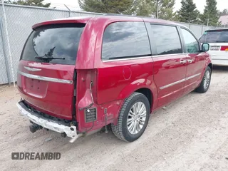 2014 Chrysler Town & Country Touring L with VIN 2C4RC1CGXER307492, listed as a IAAI auction lot 42021290 with 98,845 mi miles and . Bid and sale history available at carsss.com. Image 4.