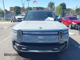 2025 Rivian R1S Adventure z VIN 7PDSGBBA1SN060468, wystawiony jako IAAI lot #41711770 z przebiegiem 2865 mil mil oraz . Historia ofert i sprzedaży dostępna na DreamBid. Obrazek 13.
