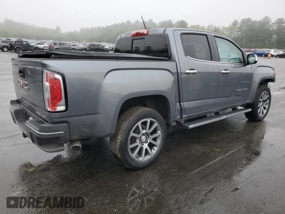 2022 GMC Canyon 4WD Denali with VIN 1GTG6EEN0N1147922, listed as a Copart auction lot 54143435 with 68,650 mi miles and Salvage title. Bid and sale history available at DreamBid. Image 3.