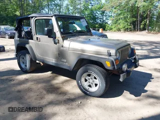 2003 Jeep Wrangler Sport z VIN 1J4FA49S13P313180, wystawiony jako IAAI lot #42349673 z przebiegiem 141 073 mil mil oraz . Historia ofert i sprzedaży dostępna na DreamBid. Obrazek 1.