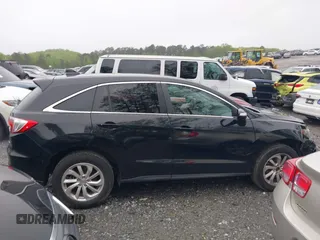 2016 Acura RDX with VIN 5J8TB4H33GL000260, listed as a IAAI auction lot 41965622 with 128,360 mi miles and . Bid and sale history available at DreamBid. Image 13.