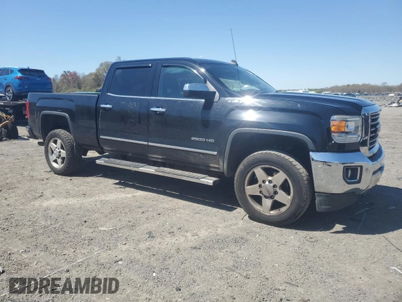 2015 GMC Sierra 2500HD SLT with VIN 1GT12ZEG2FF600811, listed as a Copart auction lot 53830145 with 199,017 mi miles and Clean title. Bid and sale history available at DreamBid. Image 4.