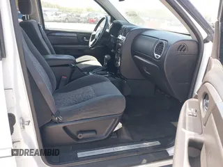 2006 GMC Envoy SLE with VIN 1GKDT13SX62258586, listed as a IAAI auction lot 42045967 with 143,225 mi miles. Bid and sale history available at carsss.com. Image 5.