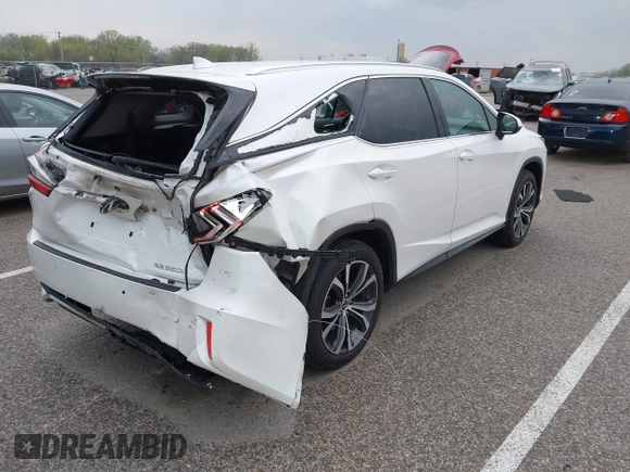 2019 Lexus RX 350L Premium with VIN JTJDZKCA5K2018635, listed as a IAAI auction lot 42008042 with 60,263 mi miles and . Bid and sale history available at DreamBid. Image 4.