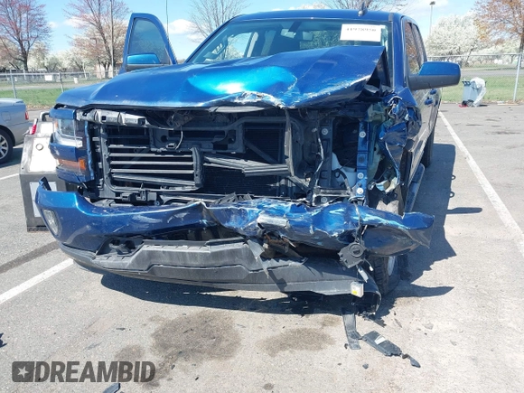 2017 Chevrolet Silverado 1500 LT with VIN 1GCVKREC6HZ312970, listed as a IAAI auction lot 41978950 with 104,239 mi miles and . Bid and sale history available at DreamBid. Image 6.