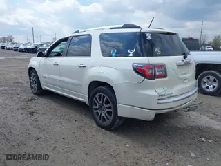 2014 GMC Acadia Denali with VIN 1GKKVTKD3EJ138763, listed as a IAAI auction lot 42011739 with 142,894 mi miles. Bid and sale history available at carsss.com. Image 3.