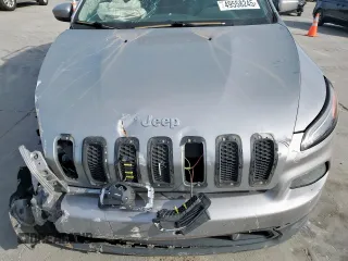 2015 Jeep Cherokee Latitude with VIN 1C4PJLCB4FW539933, listed as a Copart auction lot 49558245 with 142,828 mi miles and Salvage Title. Bid and sale history available at carsss.com. Image 12.