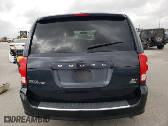 2014 Dodge Grand Caravan SXT with VIN 2C4RDGCGXER209286, listed as a Copart auction lot 51536975 with 173,821 mi miles and Salvage Title. Bid and sale history available at DreamBid. Image 6.