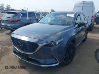 2021 Mazda CX-9 Carbon Edition z VIN JM3TCBDY0M0526352, wystawiony jako IAAI lot #42403901 z przebiegiem 50 193 mil mil oraz . Historia ofert i sprzedaży dostępna na DreamBid. Obrazek 17.