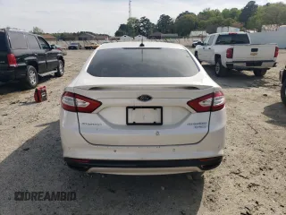 2014 Ford Fusion Titanium с VIN 3FA6P0K99ER290334, выставлен на аукционе Copart как лот 54534895 с пробегом 210 149 миль миль и Списание • Salvage title. История ставок и продаж доступна на DreamBid. Изображение 6.