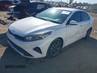 2023 Kia Forte LXS with VIN 3KPF24AD9PE605634, listed as a IAAI auction lot 41735831 with 18,042 mi miles. Bid and sale history available at carsss.com. Image 2.