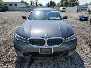 2021 BMW 3 Series 330i xDrive with VIN WBA5R7C00MFK50404, listed as a Copart auction lot 56010064 with 22,905 mi miles. Bid and sale history available at carsss.com. Image 5.