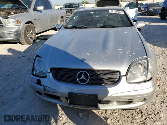 2004 Mercedes-Benz SLK-Class with VIN WDBKK65FX4F300214, listed as a Copart auction lot 82160974 with 75,964 mi miles and Salvage Title. Bid and sale history available at carsss.com. Image 5.