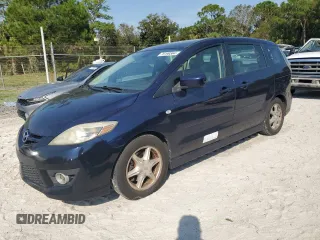 2009 Mazda 5 Touring with VIN JM1CR293X90359381, listed as a Copart auction lot 76199564 with 236,463 mi miles and Salvage Title. Bid and sale history available at DreamBid. Image 1.