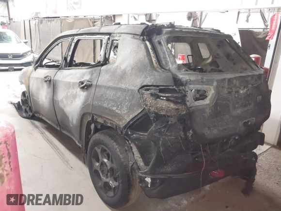 2022 Jeep Compass Trailhawk with VIN 3C4NJDDB2NT233782, listed as a IAAI auction lot 42137677 with Not provided miles and . Bid and sale history available at DreamBid. Image 3.