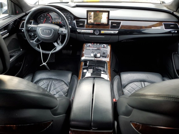 2016 Audi A8 L 4.0T Sport with VIN WAU43AFD3GN010931, listed as a Copart auction lot 81960634 with 131,841 mi miles and Salvage Title. Bid and sale history available at carsss.com. Image 8.