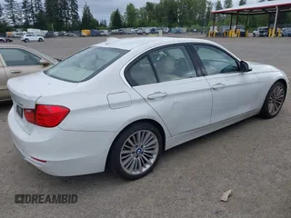 2012 BMW 3 Series 328i with VIN WBA3A5C56CF340427, listed as a IAAI auction lot 42246689 with 149,419 mi miles and . Bid and sale history available at DreamBid. Image 4.