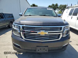 2018 Chevrolet Suburban Premier with VIN 1GNSCJKC4JR189639, listed as a Copart auction lot 64221035 with 110,256 mi miles and Salvage title. Bid and sale history available at DreamBid. Image 5.