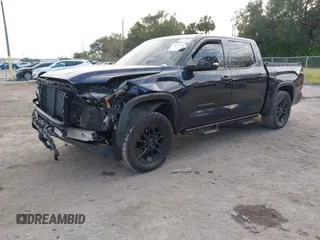 2022 Toyota Tundra 2WD SR5 with VIN 5TFLA5AB3NX009183, listed as a IAAI auction lot 41029101 with 104,806 mi miles. Bid and sale history available at carsss.com. Image 2.