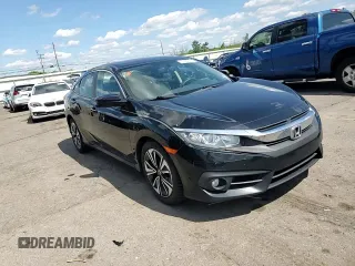 2018 Honda Civic EX-L z VIN 19XFC1F77JE200457, wystawiony jako Copart lot #55989755 z przebiegiem 95 080 mil mil oraz Szkoda całkowita • Salvage title. Historia ofert i sprzedaży dostępna na DreamBid. Obrazek 13.