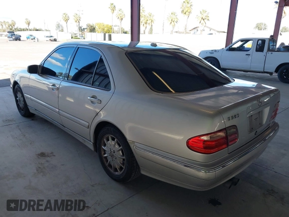 2001 Mercedes-Benz E-Class with VIN WDBJF65J81B215945, listed as a IAAI auction lot 41707410 with 227,668 mi miles. Bid and sale history available at carsss.com. Image 3.