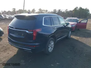 2023 Cadillac XT6 Luxury with VIN 1GYKPBR41PZ136918, listed as a IAAI auction lot 41417724 with 57,949 mi miles. Bid and sale history available at carsss.com. Image 4.