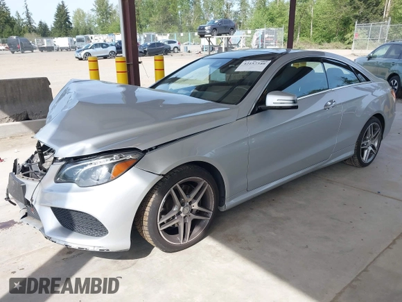 2016 Mercedes-Benz E 400 with VIN WDDKJ6HB6GF328700, listed as a IAAI auction lot 42157340 with 125,183 mi miles and . Bid and sale history available at DreamBid. Image 2.