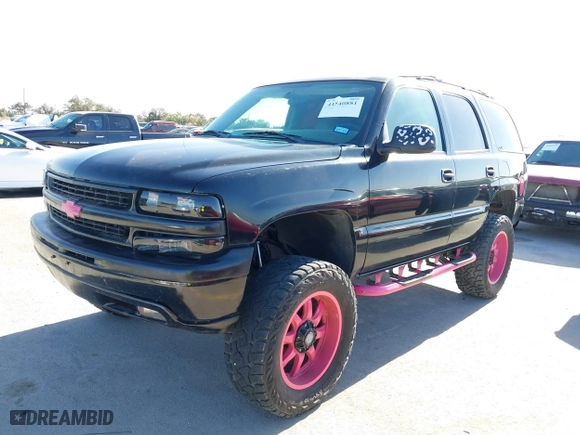 2004 Chevrolet Tahoe LT with VIN 1GNEC13ZX4R234118, listed as a IAAI auction lot 41840881 with 360,534 mi miles. Bid and sale history available at carsss.com. Image 2.