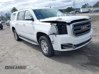 2015 GMC Yukon XL SLT with VIN 1GKS1HKC7FR126375, listed as a IAAI auction lot 41689017 with 218,622 mi miles. Bid and sale history available at carsss.com. Image 1.