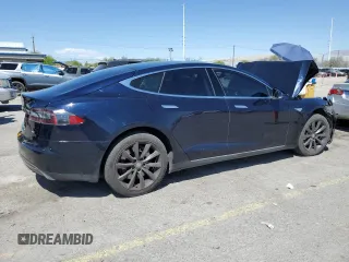 2014 Tesla Model S 60 with VIN 5YJSA1H13EFP38425, listed as a Copart auction lot 54156245 with 183,968 mi miles and Salvage title. Bid and sale history available at DreamBid. Image 3.