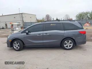 2018 Honda Odyssey EX-L with VIN 5FNRL6H72JB076597, listed as a IAAI auction lot 41838664 with 154,647 mi miles and . Bid and sale history available at DreamBid. Image 14.