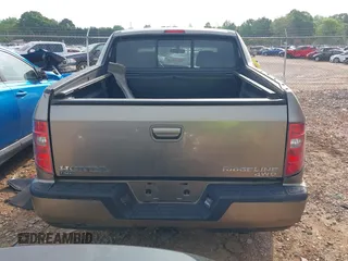 2010 Honda Ridgeline RTL with VIN 5FPYK1F50AB003576, listed as a IAAI auction lot 42050763 with 183,197 mi miles. Bid and sale history available at carsss.com. Image 16.