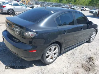 2007 Mazda 3 s Touring with VIN JM1BK323571631973, listed as a IAAI auction lot 41990310 with 287,946 mi miles. Bid and sale history available at carsss.com. Image 4.