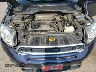 2015 MINI Countryman S z VIN WMWZC5C54FWP48739, wystawiony jako Copart lot #58197575 z przebiegiem 119 816 mil mil oraz Szkoda całkowita • Salvage title. Historia ofert i sprzedaży dostępna na DreamBid. Obrazek 11.