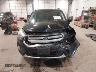 2017 Ford Escape SE with VIN 1FMCU9G98HUD67920, listed as a IAAI auction lot 40937291 with 124,302 mi miles. Bid and sale history available at carsss.com. Image 12.