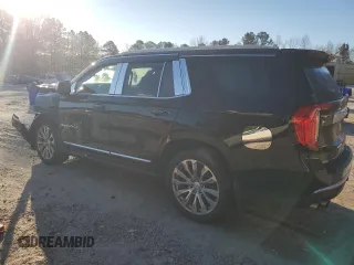 2021 GMC Yukon Denali with VIN 1GKS2DKL5MR171592, listed as a Copart auction lot 88767015 with 62,674 mi miles and Salvage Title. Bid and sale history available at carsss.com. Image 2.