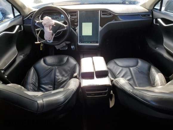 2014 Tesla Model S 60 with VIN 5YJSA1H13EFP38425, listed as a Copart auction lot 63686205 with 183,968 mi miles and Salvage title. Bid and sale history available at DreamBid. Image 8.
