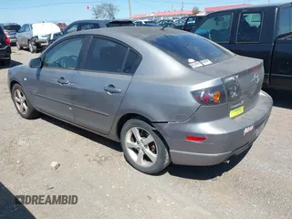 2006 Mazda 3 s Grand Touring with VIN JM1BK323261410457, listed as a IAAI auction lot 42057678 with 203,872 mi miles. Bid and sale history available at carsss.com. Image 3.