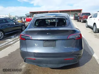 2023 Tesla Model Y Long Range with VIN 7SAYGDEE3PA204992, listed as a IAAI auction lot 41849104 with 22,490 mi miles. Bid and sale history available at carsss.com. Image 16.