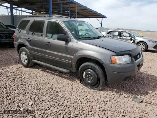 2003 Ford Escape XLT Popular with VIN 1FMYU03103KC43310, listed as a Copart auction lot 50362285 with 69,308 mi miles and Salvage Title. Bid and sale history available at carsss.com. Image 4.