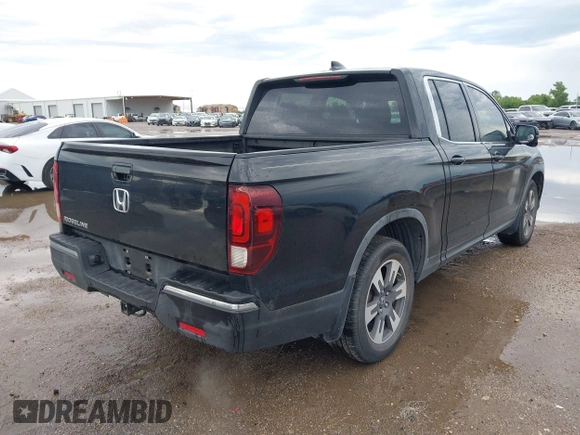 2017 Honda Ridgeline RTL-T with VIN 5FPYK2F64HB003542, listed as a IAAI auction lot 42171243 with 102,071 mi miles and . Bid and sale history available at DreamBid. Image 4.