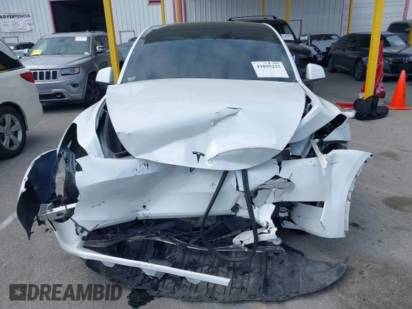 2023 Tesla Model Y Long Range with VIN 7SAYGDEE9PA026005, listed as a IAAI auction lot 41895223 with 43,813 mi miles and . Bid and sale history available at DreamBid. Image 12.