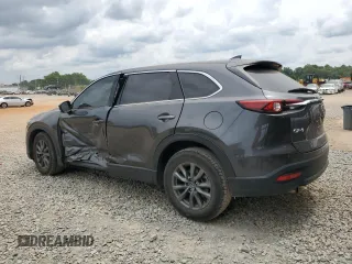 2020 Mazda CX-9 Touring z VIN JM3TCACY3L0411822, wystawiony jako Copart lot #60323295 z przebiegiem 61 348 mil mil oraz Szkoda całkowita • Salvage title. Historia ofert i sprzedaży dostępna na DreamBid. Obrazek 2.