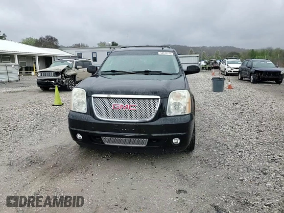 2011 GMC Yukon XL Denali z VIN 1GKS2MEF4BR140739, wystawiony jako Copart lot #50979175 z przebiegiem 237 005 mil mil oraz Szkody całkowita. Historia ofert i sprzedaży dostępna na DreamBid. Obrazek 12.