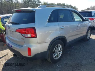 2014 Kia Sorento LX z VIN 5XYKT3A69EG437937, wystawiony jako IAAI lot #41834416 z przebiegiem 208 671 mil mil oraz . Historia ofert i sprzedaży dostępna na DreamBid. Obrazek 4.